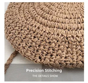 Detail view of khaki straw bag featuring precise woven craftsmanship and neat stitching