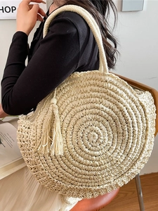 Chic cream straw woven tote bag with fringe tassel detail for summer vacations