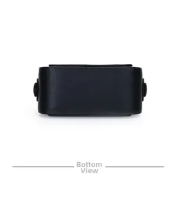 Detailed bottom view of black leather crossbody bag showing smooth texture and shape