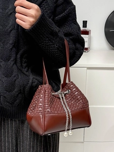 Burgundy bucket bag with woven texture, silver chain drawstring and pearl charms for women
