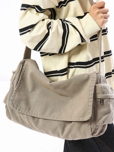 Khaki washed canvas messenger bag for women featuring large capacity and adjustable strap