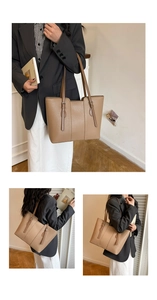 Three-view layout of large khaki tote bag with textured leather and belt buckle detail