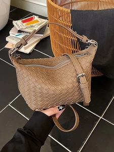 Brown woven crossbody bag with silver zipper and adjustable strap for daily fashion