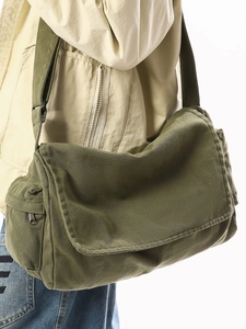 Washed canvas messenger bag in army green with retro casual crossbody strap design