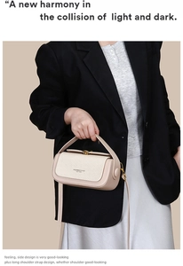 Detail of minimalist beige leather crossbody bag with woven texture and gold twist lock