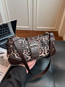 Retro leopard print baguette bag with silver buckles and studs for vintage style