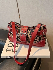 Vintage leopard print shoulder bag with red leather trim and silver metal hardware studs