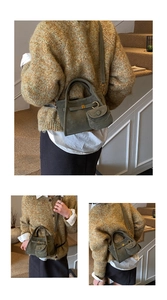 Detail view of olive green suede bucket bag with gold hardware and mini coin purse