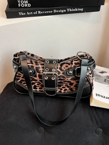 Vintage leopard print shoulder bag with silver rivets and large buckle detail