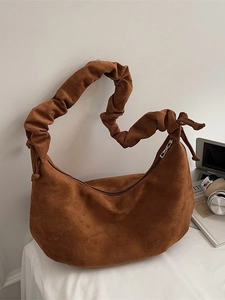 Brown faux suede crescent tote bag with stylish ruched shoulder strap for women