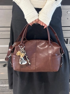 Retro dark brown Boston bag with glossy PU leather, leopard bow and heart pendant
