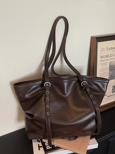 Vintage braune Shopper Tasche aus Leder mit silbernen Ösenriemen und großem Fassungsvermögen