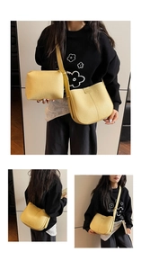 Detail view of ginger yellow lychee pattern leather hobo bag with matching small pouch