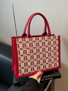 Elegant red wedding tote bag with traditional Double Happiness pattern and leather handles