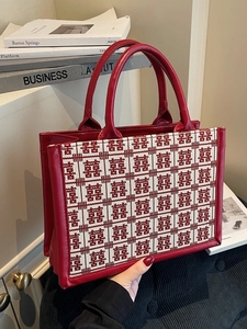 Red bridal tote bag with Xi character jacquard and sleek red leather trim accents