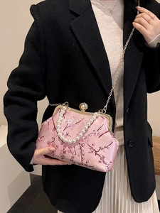 Pink silk evening bag with cherry blossom embroidery and elegant pearl handle