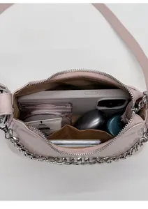 Top view showing internal storage of the pink oil wax leather shoulder bag with silver chain