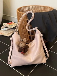 Pink large capacity faux leather tote bag with cute bear charm and adjustable straps