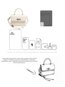 Detailed interior storage capacity of white leather handbag with metal turn-lock