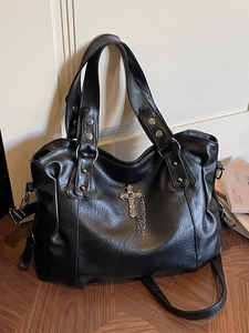 Black vintage PU leather tote bag with silver cross chain and metal stud details