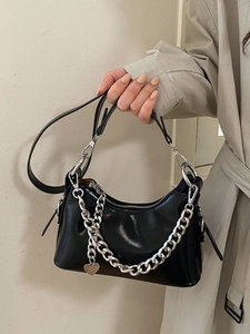Retro black oil wax leather underarm bag with silver chain and heart charm detail