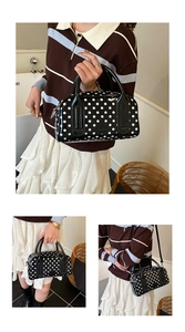 French vintage style polka dot handbag with dual handles and detachable shoulder strap