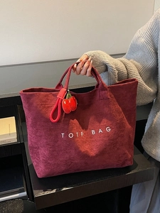 Deep red suede tote bag with TOTF BAG embroidery and cherry charm for daily commute