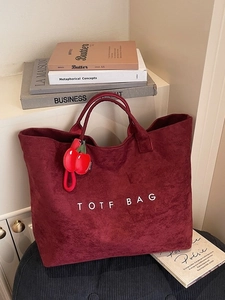 Large burgundy faux suede tote bag with cherry charm and Tote Bag printed text