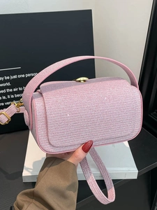 Pink glitter crossbody handbag with golden hardware and detachable strap for women