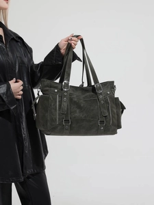 Vintage dark green oversized tote bag with silver hardware and functional pockets