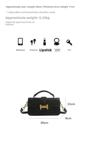 Detail view of black litchi grain leather bag with gold H-buckle and size dimensions