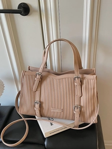 Fashionable apricot pleated tote bag with silver buckles and adjustable shoulder strap
