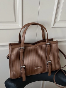 Retro pleated caramel brown leather tote bag with silver buckles for women