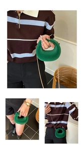 Three lifestyle views of an emerald green velvet donut-shaped bag with gold chain