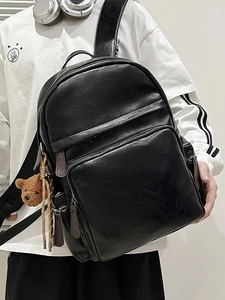 Minimalist black PU leather backpack for students with teddy charm and large pockets