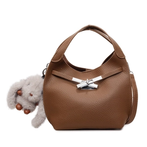Brown litchi grain leather bucket bag with silver bow buckle and rabbit charm