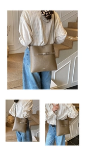 Détail du sac seau en cuir grainé vert kaki avec boucle argentée et bandoulière fine