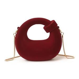 Red matte suede crescent handbag with gold chain strap for women, minimalist luxury style