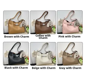 Multi-color bucket bags featuring lychee grain leather and classic metal turn-lock detail