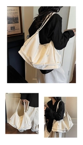 Detailed views of a white large-capacity tote bag with side belt buckle adjustments