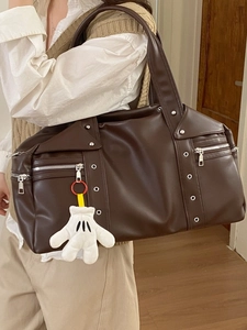 Retro brown oversized PU leather travel bag with silver studs and plush glove charm