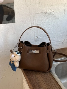 Vintage dark brown pebble leather bucket bag with metal lock and cute bear charm