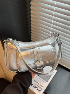 Metallic silver pleated shoulder bag with Y2K vintage style and buckle detail