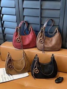 Retro suede hobo bags in four colors with metal ring charms and adjustable straps