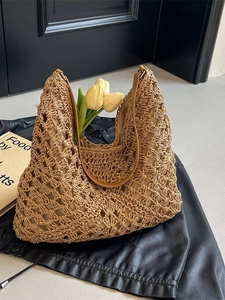Large woven hobo tote bag with hollow geometric knit pattern and leather strap