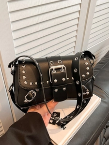 Fashionable black faux leather rivet shoulder bag with metal buckle in punk style