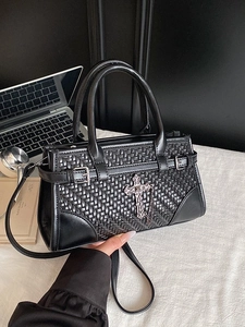 Retro black woven handbag with vintage metal cross and chain strap in city style