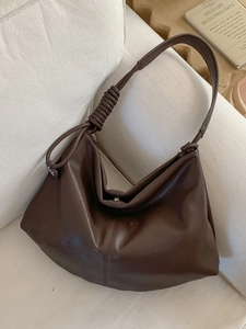 Retro dark brown oversized tote bag with spiral handle on soft leather hobo bag