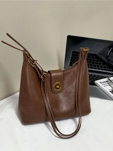 Classic brown leather Hobo shoulder bag with gold twist lock for commute