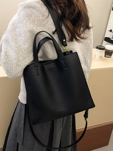 Fashionable black lychee leather tote bag with large capacity for daily commuting